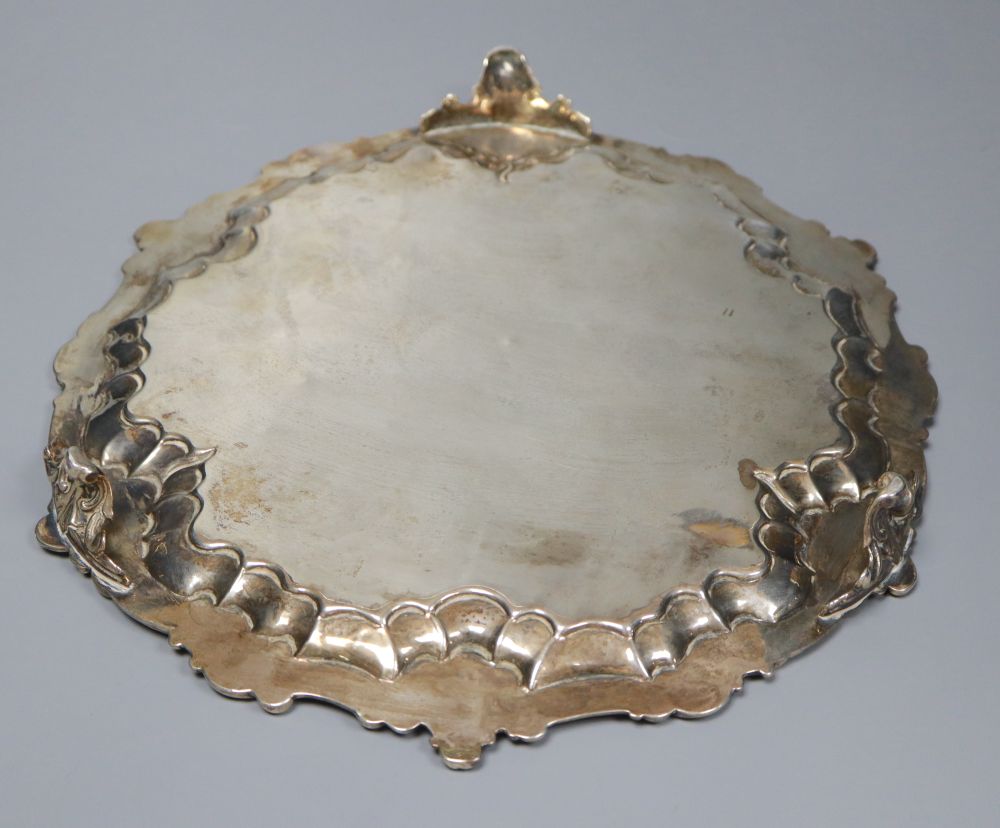 A Victorian embossed silver milk jug, Sheffield, 1860 and a silver salver, London, 1857, 27.5cm, 26oz.